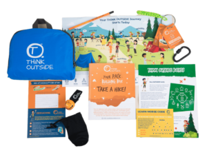 Product display of a monthly subscription from Think Outside Subscription Box, one of the best outdoor gift ideas for kids this Christmas.