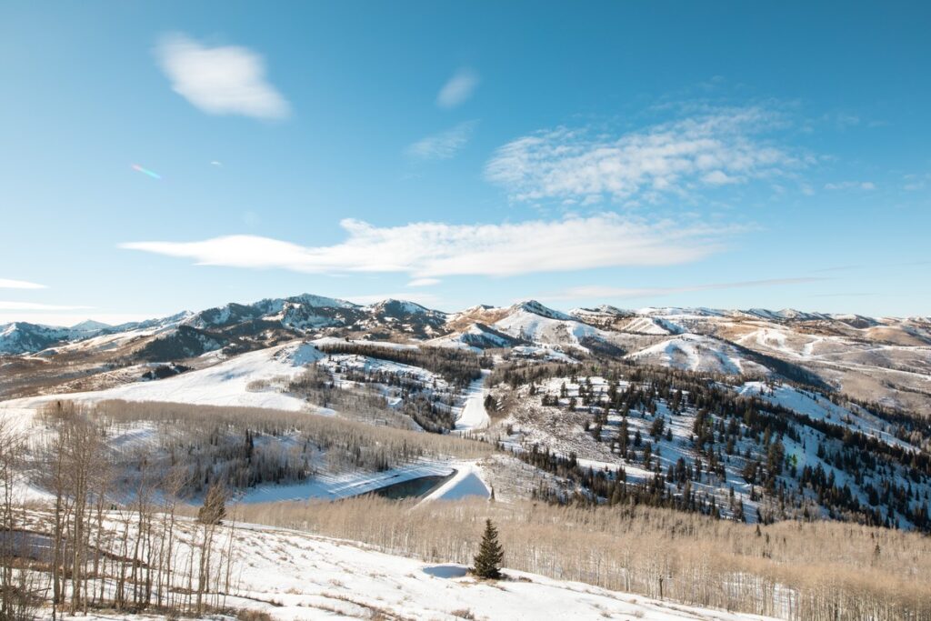 A view of snowy mountains in Park City, Utah, one of the best winter vacations for families.